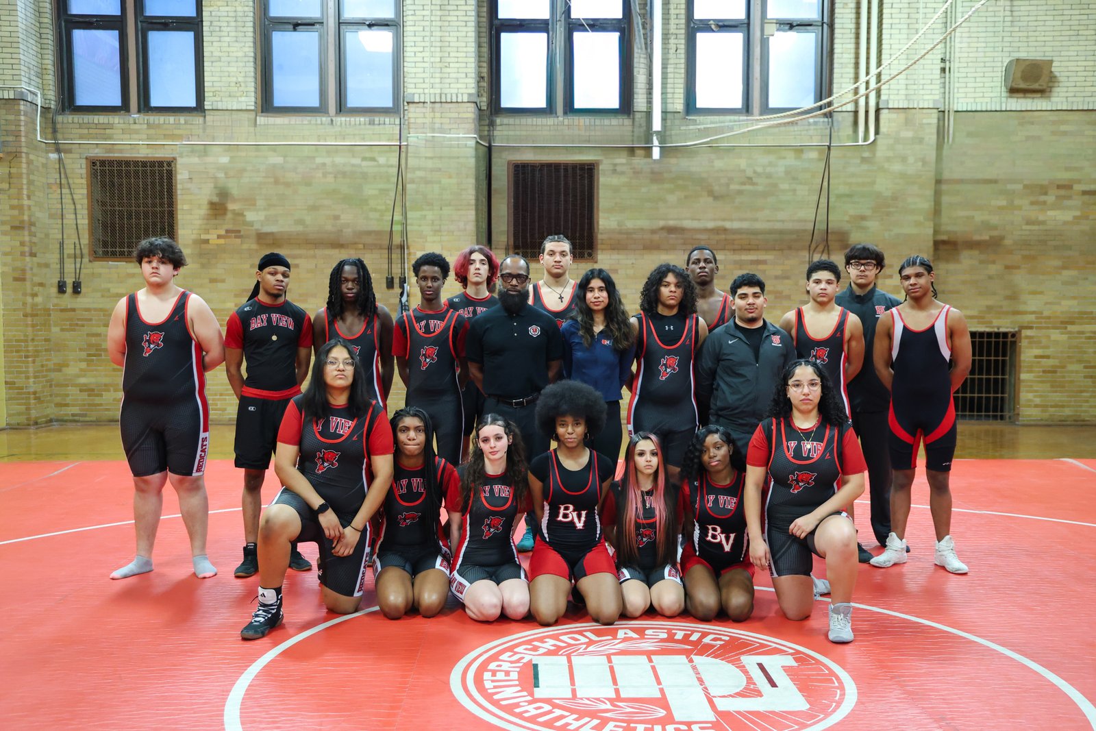Bridges Between Neighbors full wrestling team photo